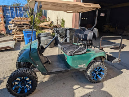 2009 EZ-GO TXT new lithium battery, new lift kit tires & rims, and new rear seat